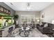 Cozy living room with a large TV, stylish furniture, and neutral decor at 16246 W Talara Way, Surprise, AZ 85374