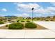 Community park featuring playground, picnic area, open green space and a basketball court at 17424 W Willow Ave, Surprise, AZ 85388