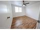 Comfortable bedroom featuring natural light, wood-look flooring, and neutral color palette at 18811 N 19Th Ave # 2020, Phoenix, AZ 85027