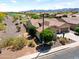 Aerial view of a single Gathering home featuring desert landscaping and a tile roof in a golf course community at 20655 N 273Rd Ave, Buckeye, AZ 85396