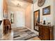Welcoming foyer featuring a stylish rug, charming decor, and a decorative front door at 20655 N 273Rd Ave, Buckeye, AZ 85396