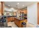 Spacious kitchen boasts granite countertops, stainless appliances, and a center island at 20655 N 273Rd Ave, Buckeye, AZ 85396