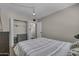 Simple and comfortable bedroom featuring a double bed, storage, and closet at 225 N Standage -- # 139, Mesa, AZ 85201