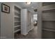 Hallway with carpet, a linen closet and view into a bedroom at 225 N Standage -- # 139, Mesa, AZ 85201
