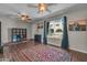 Spacious living room with hardwood floors, area rug, and large windows offering abundant natural light at 225 N Standage -- # 139, Mesa, AZ 85201