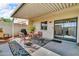 Cozy outdoor patio featuring a table, chairs, and grill, perfect for entertaining at 225 N Standage -- # 139, Mesa, AZ 85201