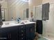 Bathroom features a double sink vanity with lots of counter space and a glass-enclosed shower at 23644 S 209Th Pl, Queen Creek, AZ 85142