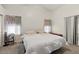 Bright bedroom featuring neutral walls, carpet, and a large closet, creating a comfortable retreat at 2467 E Winchester Pl, Chandler, AZ 85286