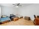 Bedroom includes multiple beds and desk and storage furniture at 2528 N 22Nd Dr, Phoenix, AZ 85009