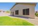A low maintenance backyard has a grassy area, gravel and artificial turf at 25860 N 47Th Pl, Phoenix, AZ 85050