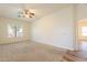 Bedroom with carpet, one window with blinds, and a ceiling fan at 25860 N 47Th Pl, Phoenix, AZ 85050