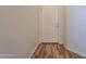 Bright entryway featuring wood-look flooring and a white front door at 25860 N 47Th Pl, Phoenix, AZ 85050