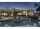 Lush backyard featuring an inviting pool, mature desert landscaping, and patio at 26049 N 104Th Pl, Scottsdale, AZ 85255