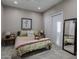 Serene bedroom with neutral colors, a comfortable bed, and ample closet space for a restful retreat at 26049 N 104Th Pl, Scottsdale, AZ 85255