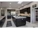Elegant kitchen with granite counters, stainless steel appliances, and a large island for cooking and entertaining at 26049 N 104Th Pl, Scottsdale, AZ 85255
