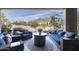 Outdoor patio with comfortable seating and views of the desert landscape at 26049 N 104Th Pl, Scottsdale, AZ 85255
