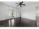 Bright bedroom with a ceiling fan, a window and sliding glass doors at 2740 N 21St Dr, Phoenix, AZ 85009