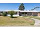 Charming single-story home with well-maintained lawn and inviting walkway, offering classic curb appeal at 2740 N 21St Dr, Phoenix, AZ 85009