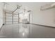 Spacious garage with washer/dryer hookups, ample room for vehicle parking, and epoxy flooring at 2740 N 21St Dr, Phoenix, AZ 85009
