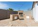 Outdoor kitchen area with a large brick BBQ, perfect for entertaining at 2740 N 21St Dr, Phoenix, AZ 85009