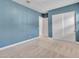 This airy, carpeted bedroom has spacious closet and neutral decor at 30909 N 27Th Ave, Phoenix, AZ 85085