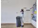 Garage water softener and water heater at 30909 N 27Th Ave, Phoenix, AZ 85085
