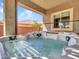 Covered hot tub with beautiful blue sky in the background at 30909 N 27Th Ave, Phoenix, AZ 85085