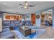 Spacious living room featuring stylish rug and furniture, with open floor plan at 30909 N 27Th Ave, Phoenix, AZ 85085