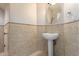 Charming powder room features decorative rope trim and pedestal sink at 31604 N 19Th Ave, Phoenix, AZ 85085