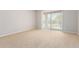 Bright and airy bedroom with neutral carpet, large sliding glass doors for backyard access at 31604 N 19Th Ave, Phoenix, AZ 85085