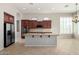 Kitchen with granite counters, stainless steel appliances, and ample cabinet space at 31604 N 19Th Ave, Phoenix, AZ 85085