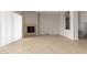 Living room with fireplace and tile flooring and bright natural light at 31604 N 19Th Ave, Phoenix, AZ 85085