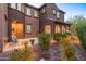 Charming home with desert landscaping, a cozy front porch, and inviting curb appeal in a friendly neighborhood at 3603 E Salter Dr, Phoenix, AZ 85050