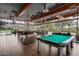 Inviting game room featuring a pool table and comfortable seating, perfect for entertaining guests at 3603 E Salter Dr, Phoenix, AZ 85050