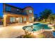 Inviting backyard pool with well-manicured landscaping and a covered patio area, perfect for outdoor relaxation at 3603 E Salter Dr, Phoenix, AZ 85050