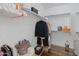 Spacious walk-in closet features shelving and hanging rods for optimal organization and storage for clothes and accessories at 3603 E Salter Dr, Phoenix, AZ 85050