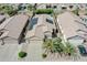 Beautiful single-story home with desert landscaping, a two-car garage, and solar panels at 3612 W Charlotte Dr, Glendale, AZ 85310