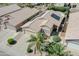 Single-story home with desert landscaping, concrete driveway, two-car garage, and solar panels at 3612 W Charlotte Dr, Glendale, AZ 85310