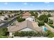 High aerial view showcasing a home with a private pool in a desert community at 3671 S Greythorne Way, Chandler, AZ 85248