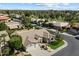 Beautiful home features a well-manicured lawn and mature landscaping, providing a serene outdoor space at 3671 S Greythorne Way, Chandler, AZ 85248