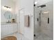 Elegant bathroom with a glass-enclosed shower, vanity, and stylish decor at 3671 S Greythorne Way, Chandler, AZ 85248