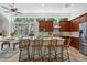 Spacious kitchen featuring an island with bar seating and natural light, perfect for entertaining at 3671 S Greythorne Way, Chandler, AZ 85248