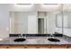 Bathroom featuring a double sink vanity with granite countertops and large mirror at 3820 E Mcdowell Rd # 102, Phoenix, AZ 85008