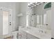 Bright bathroom with double sinks and a shower at 3898 E San Remo Ave, Gilbert, AZ 85234