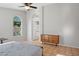 Bedroom with modern furniture and natural lighting at 3898 E San Remo Ave, Gilbert, AZ 85234