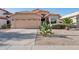 Charming single-Gathering home featuring a two-car garage, neutral stucco, and desert landscaping at 3898 E San Remo Ave, Gilbert, AZ 85234