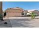 Single-Gathering home featuring neutral stucco, a two-car garage, and desert landscaping at 3898 E San Remo Ave, Gilbert, AZ 85234