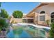 View of the pool with covered patio attached to home at 3898 E San Remo Ave, Gilbert, AZ 85234
