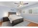 Cozy bedroom featuring plantation shutters, neutral colors, and soft carpet for comfort at 3919 S Siesta Ln, Tempe, AZ 85282