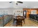 Cozy dining area with a stylish table set, open to the living room and kitchen at 3919 S Siesta Ln, Tempe, AZ 85282